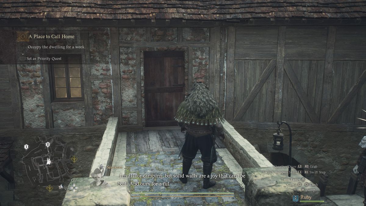 The Arisen stands in front of a home in Dragon’s Dogma 2