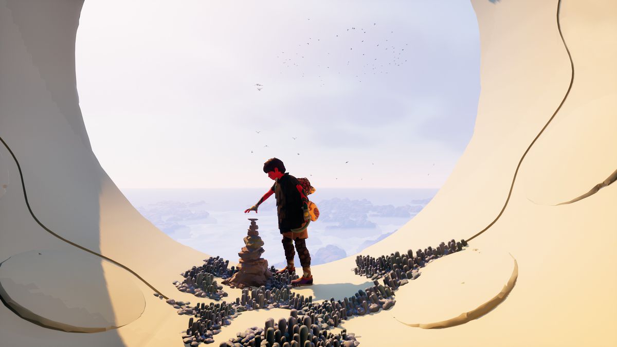 Jusant’s young hero, dressed like a rock-climber, places a stone on a cairn in a large circular pipe