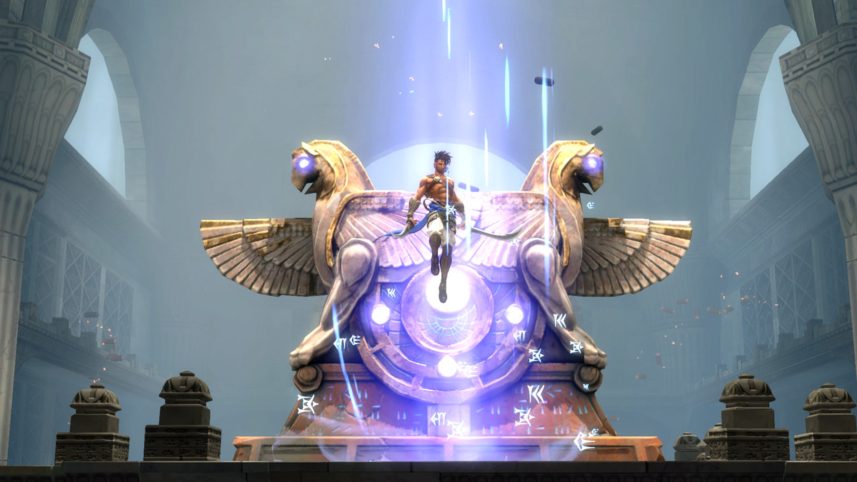 Sargon, the protagonist of Prince of Persia: The Lost Crown, hovers in the air surrounded by blue light, backed by two stone griffin statues