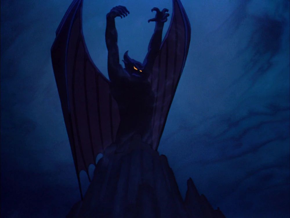 The Demon Chernabog raises his arms while perched atop Bald Mountain in Fantasia