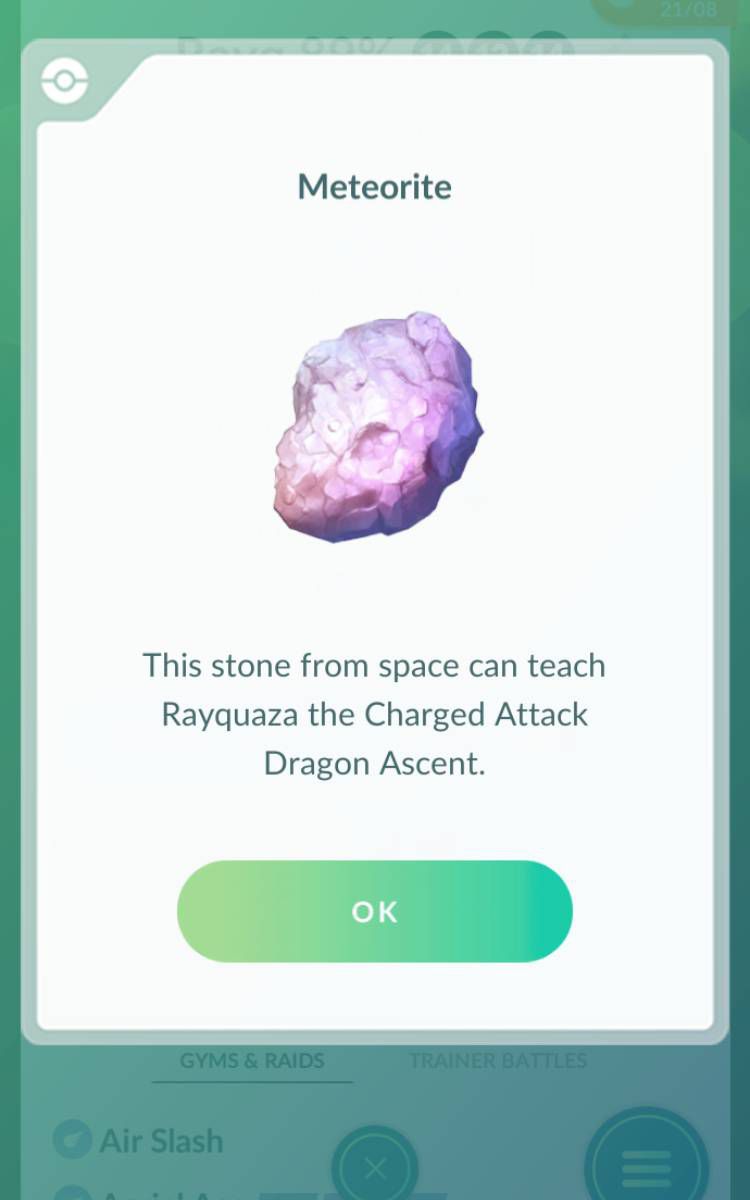 Meteorite description text reading “This stone from space can teach Rayquaza the Charged Attack Dragon Ascent” in Pokémon Go.